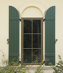 board and batten shutters on window